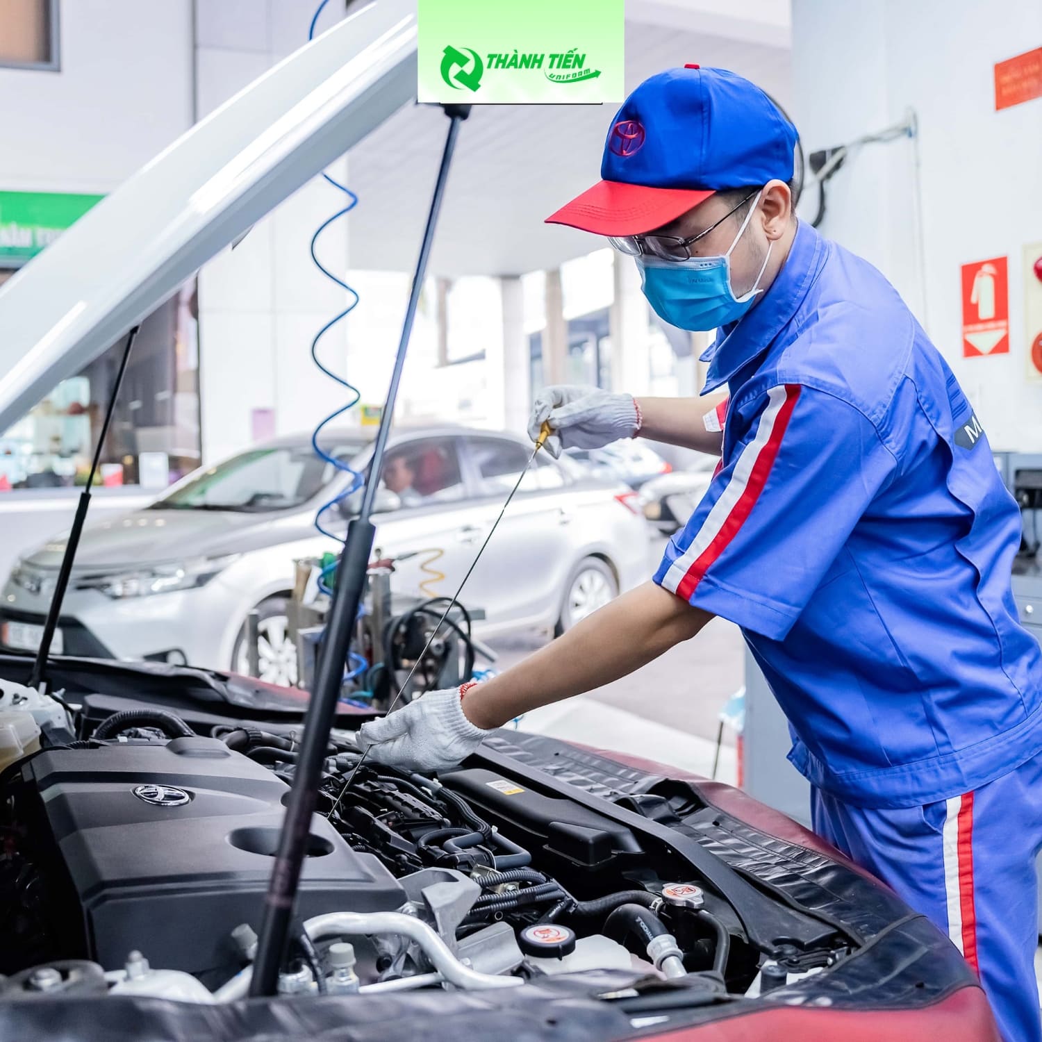 Ao dong phuc gara o to 10