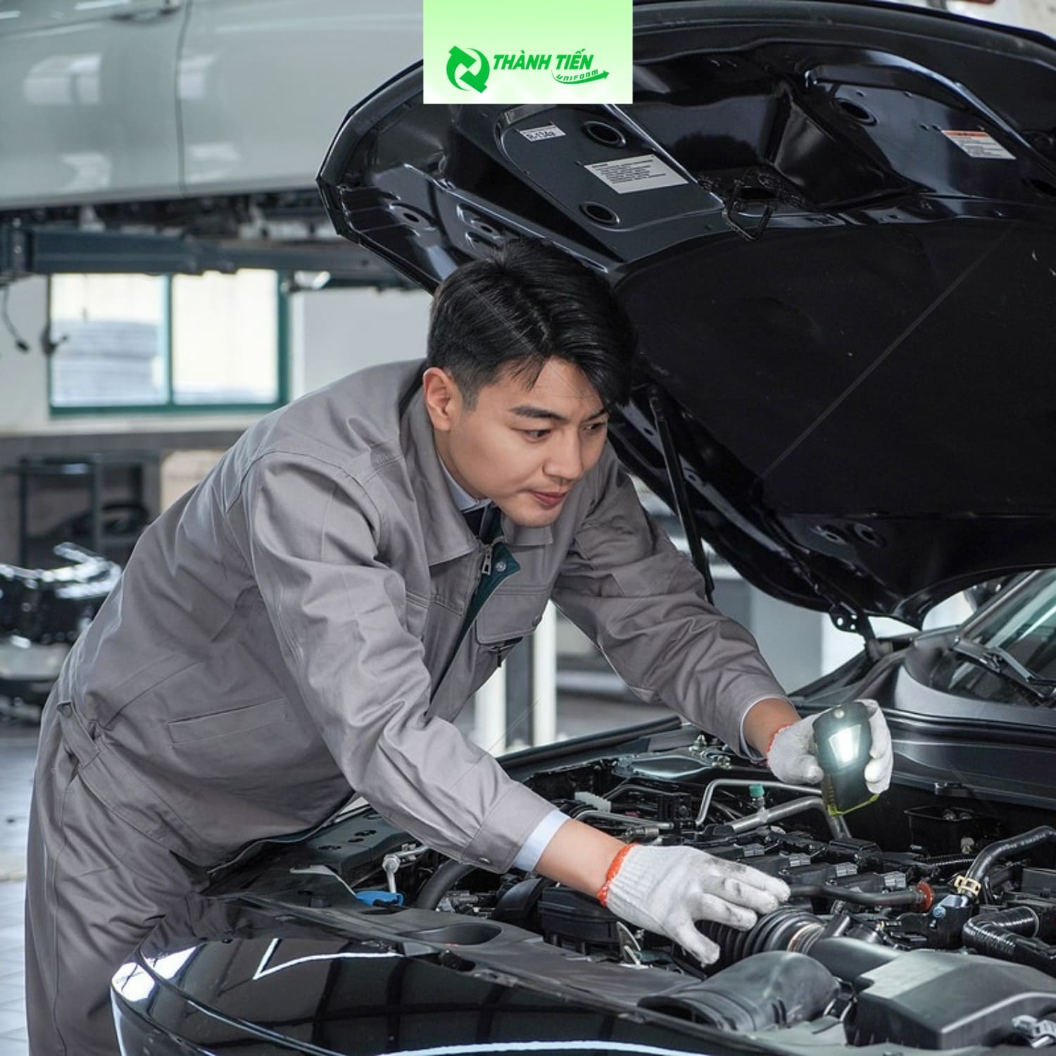 Ao dong phuc gara o to 3