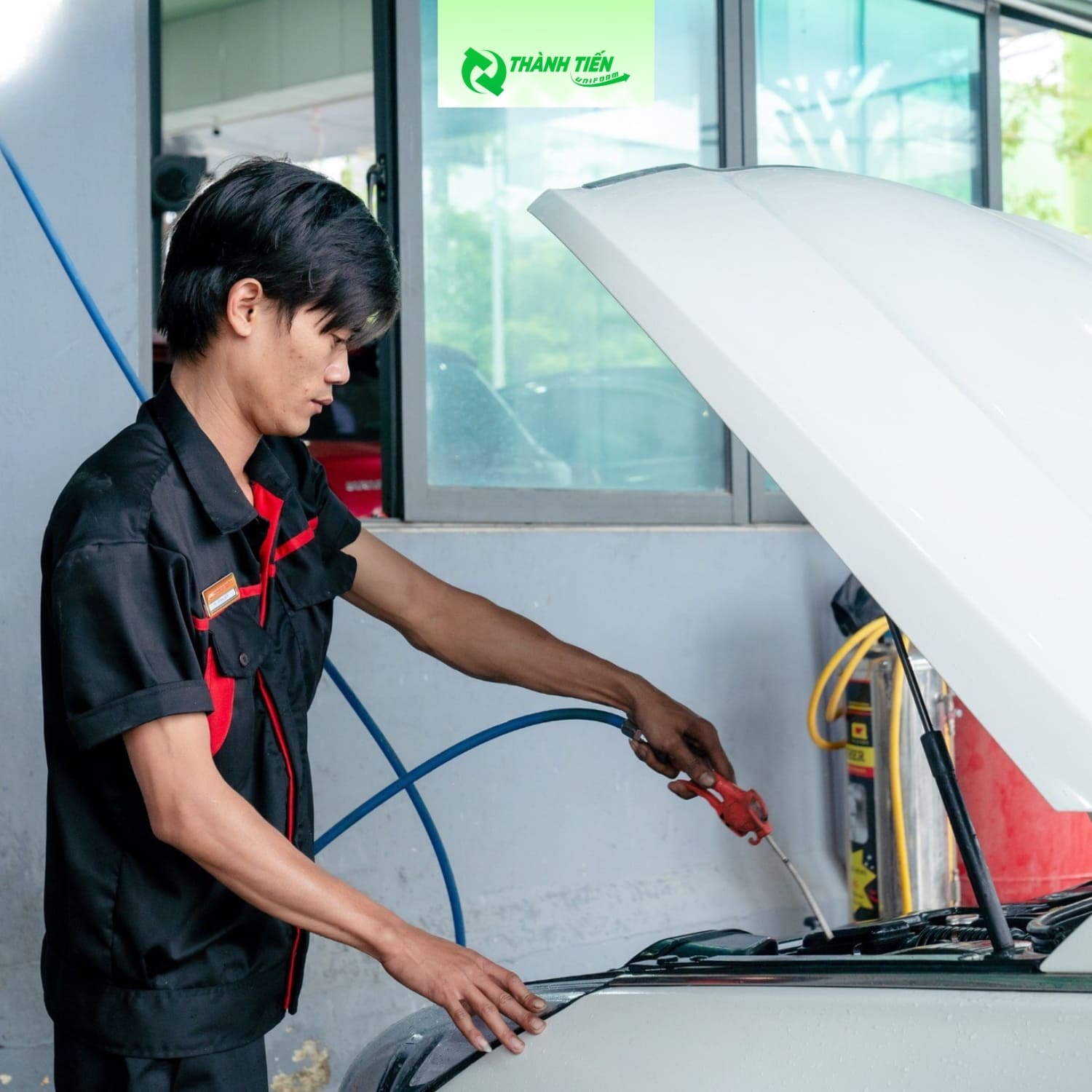 Ao dong phuc gara o to 5