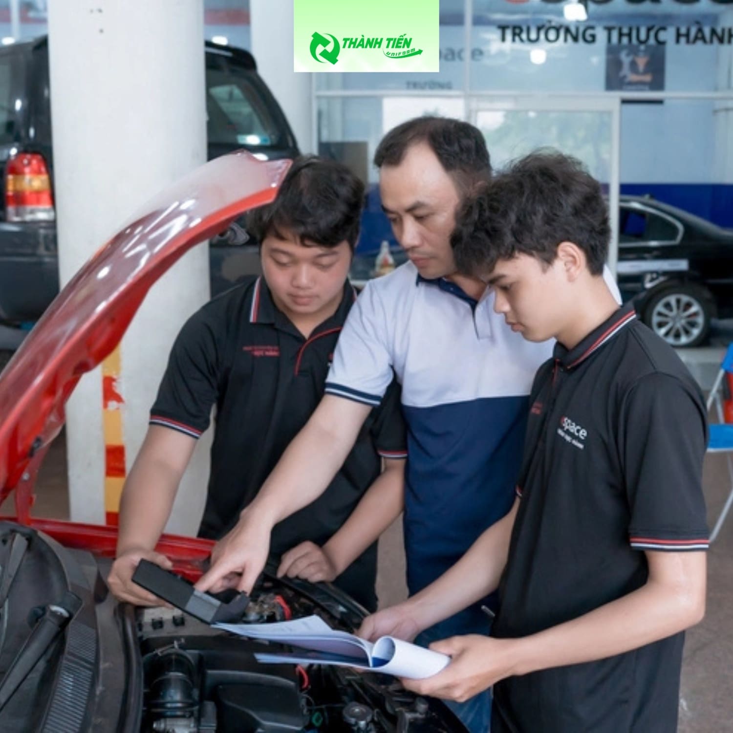 Ao dong phuc gara o to 9